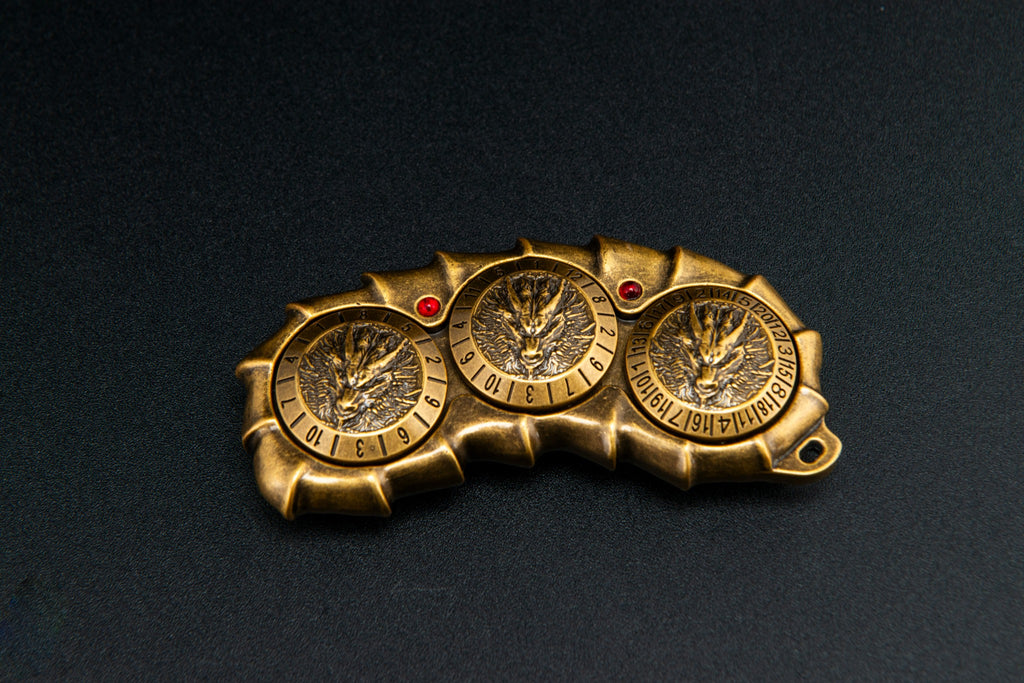 Dragon Spine, Gold finish, D10/D12/D20 side. Original product photograph.