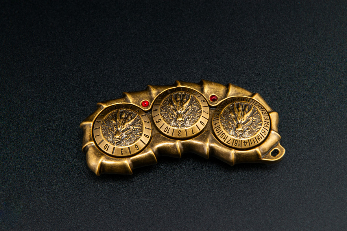 Dragon Spine, Gold finish, D10/D12/D20 side. Original product photograph.
