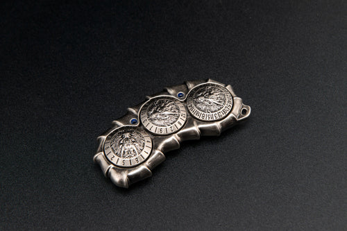 Dragon Spine, Silver finish, D10/D12/D20 side. Original product photograph.